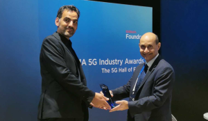 Yoni Tayar, global marketing director at TVU Networks, accepts GSMA’s 5G Innovation Challenge award on behalf of the company at Mobile World Congress in Barcelona, Spain.