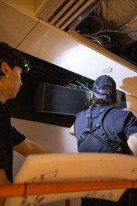 The Skylark AV team integrating one of the exhibit's X8i enclosures.